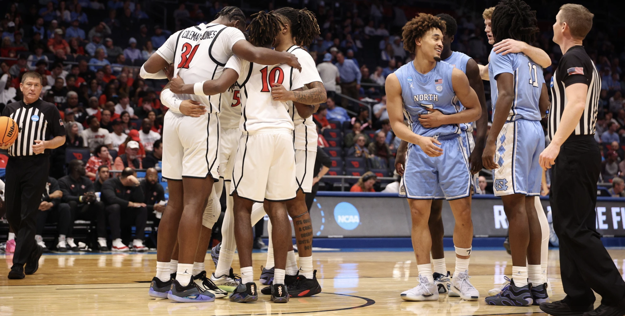 Aztecs players huddle up during the game to talk strategy. Courtesy of San Diego State athletics/DERRICK TUSKAN